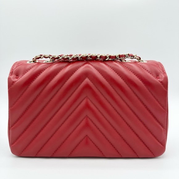 This is a 100% authentic CHANEL Calfskin Chevron Small Flap handbag in 19A Red. - Picture 10 of 16